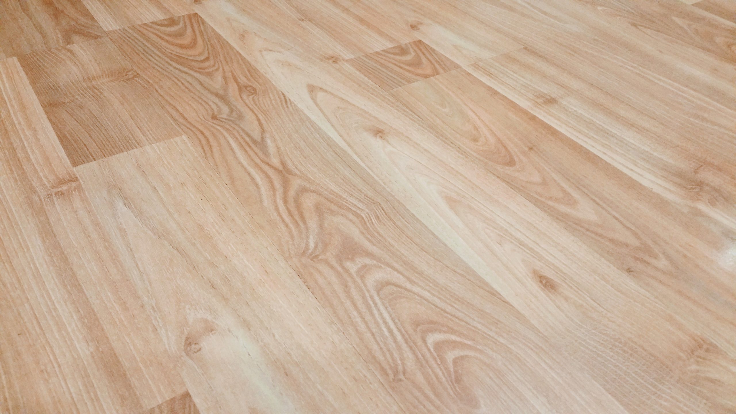 Parquet stratifié brun clair texture naturelle